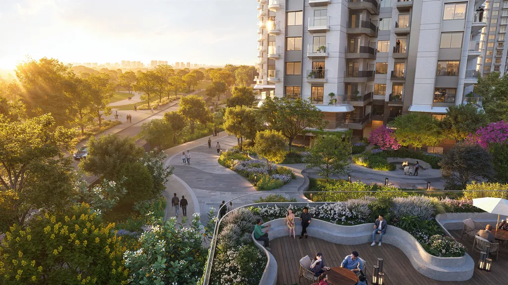 Landscaped social spaces and seating decks at the base of the Eldeco 7 Peaks towers at golden hour