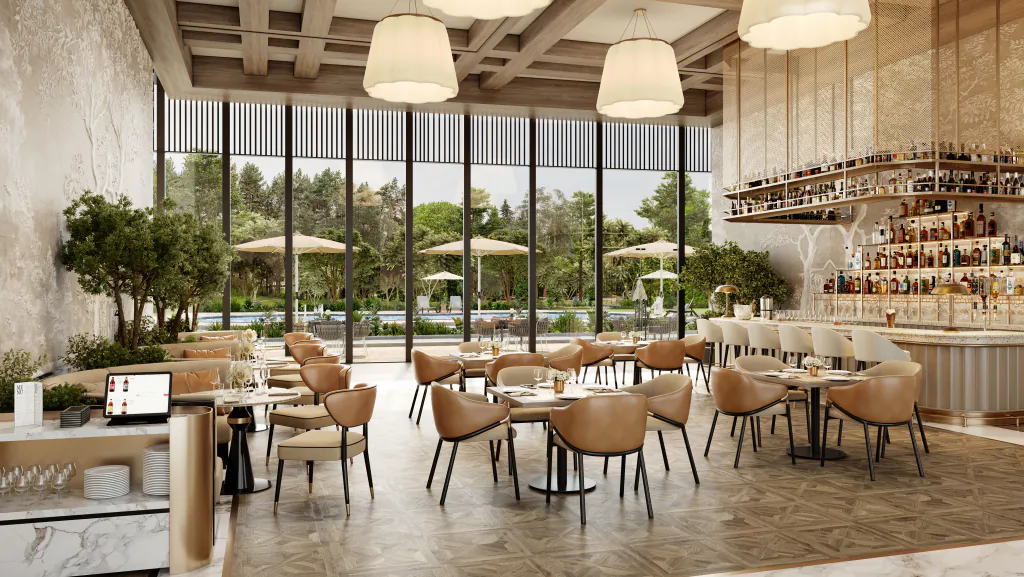 The community lounge and cafe at Eldeco 7 Peaks Residences — dining tables and chairs, a counter along one wall, and glazing onto a shaded terrace. Developer's artistic impression.